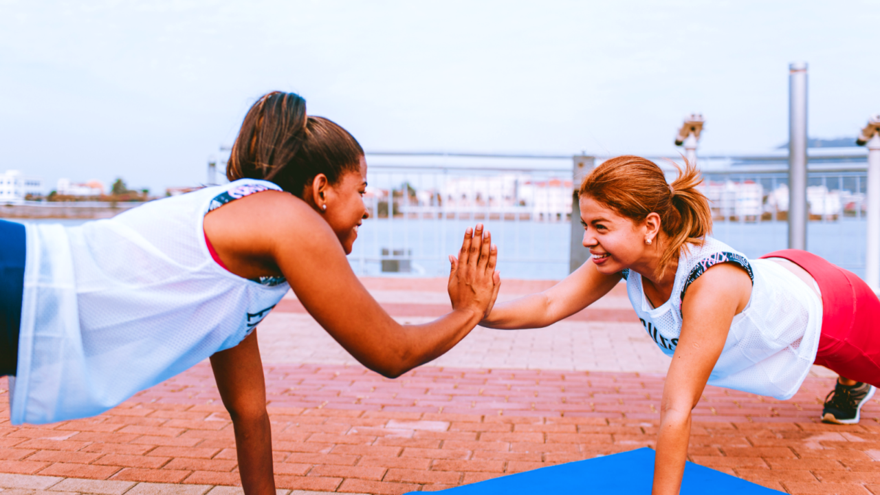 Two women doing pushups