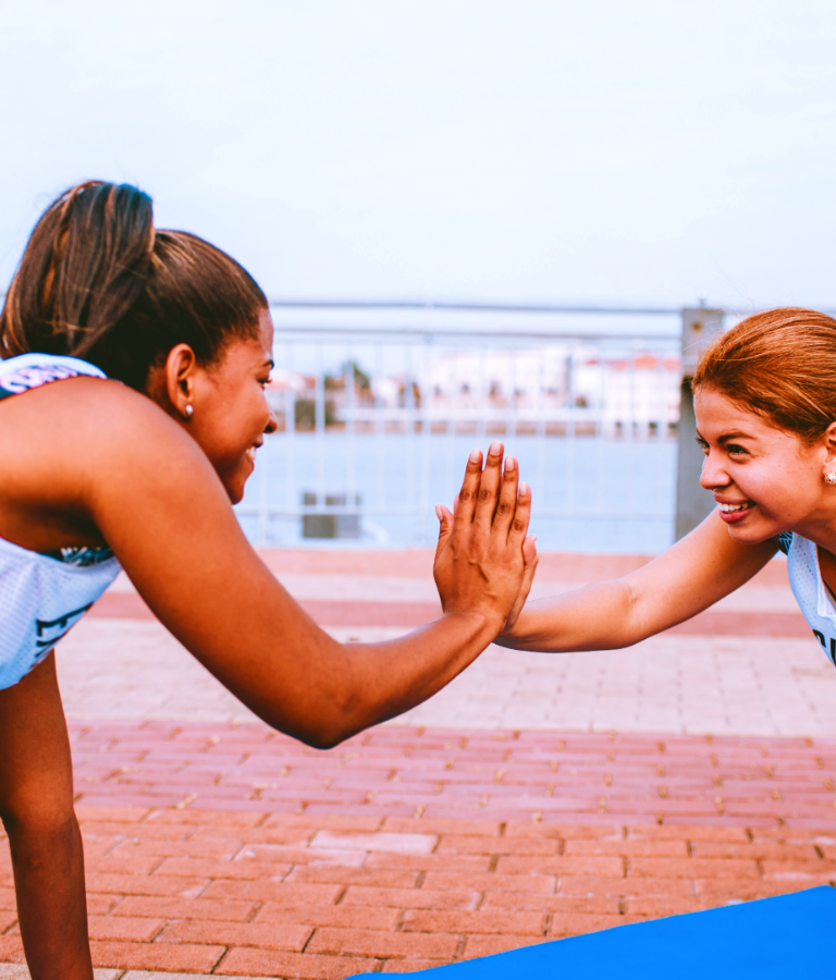 Two women doing pushups