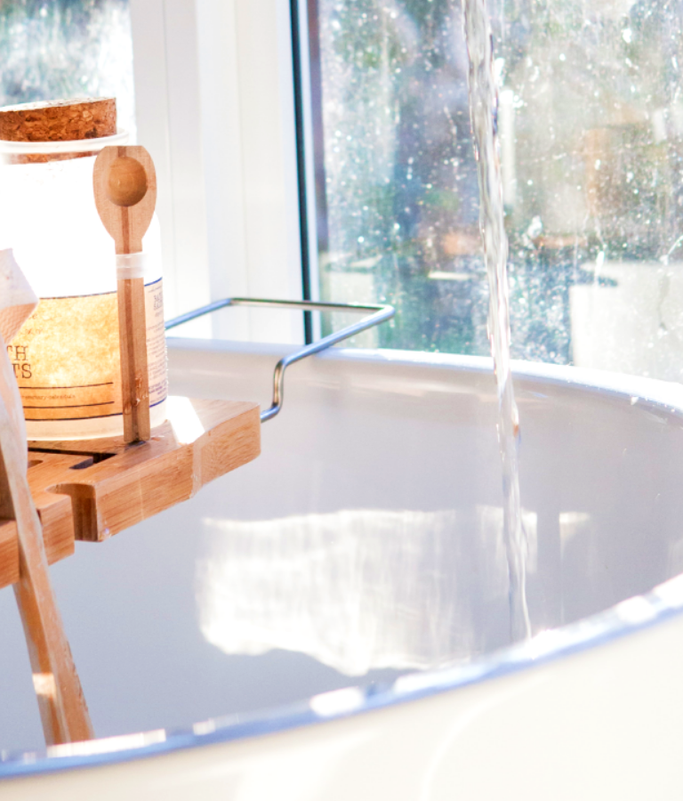 White ceramic sink beside window