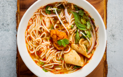 Noddle dish on white ceramic bowl