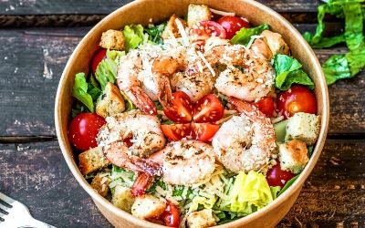 shrimp on salad in bowl